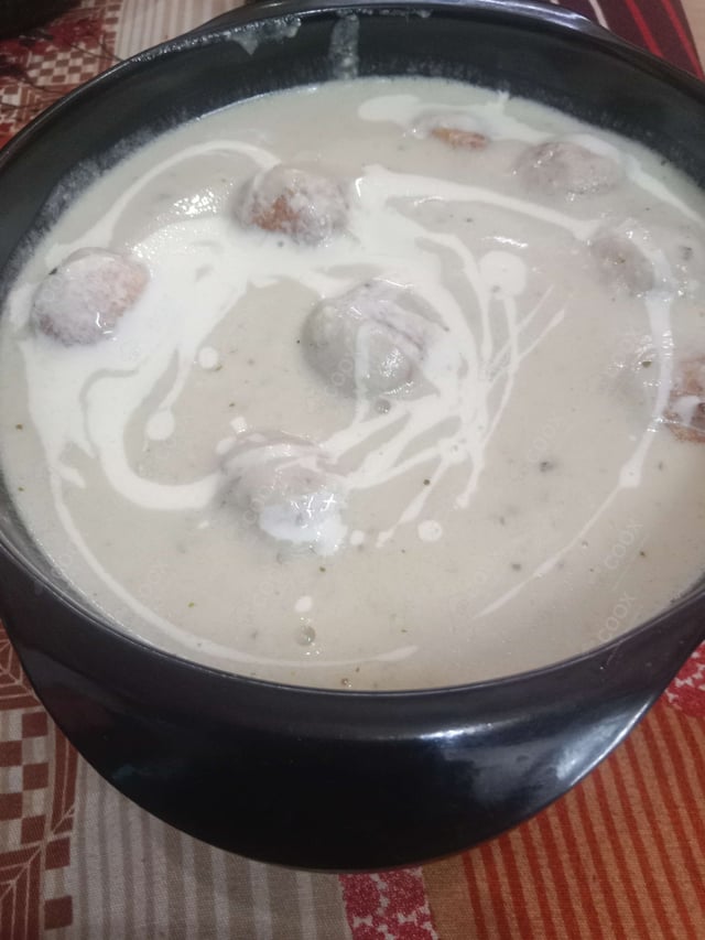 Tasty Malai Kofta (White Gravy) cooked by COOX chefs cooks during occasions parties events at home