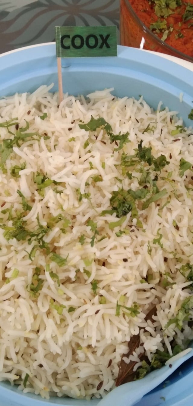 Tasty Jeera Rice cooked by COOX chefs cooks during occasions parties events at home