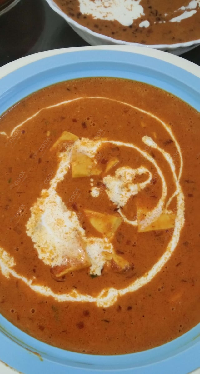 Tasty Paneer Lababdar cooked by COOX chefs cooks during occasions parties events at home