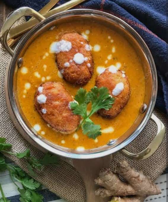 Delicious Malai Kofta (Orange Gravy) prepared by COOX