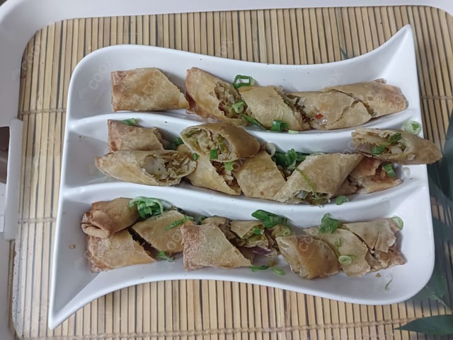 Delicious Chicken Spring Rolls prepared by COOX