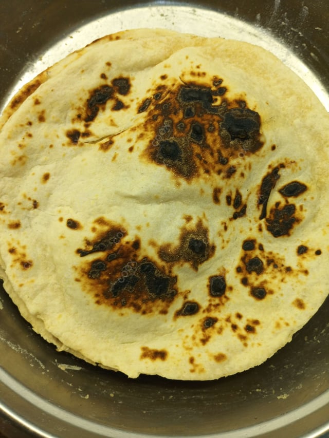 Delicious Naan (Butter / Garlic) prepared by COOX