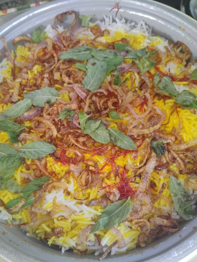 Delicious Veg Biryani prepared by COOX
