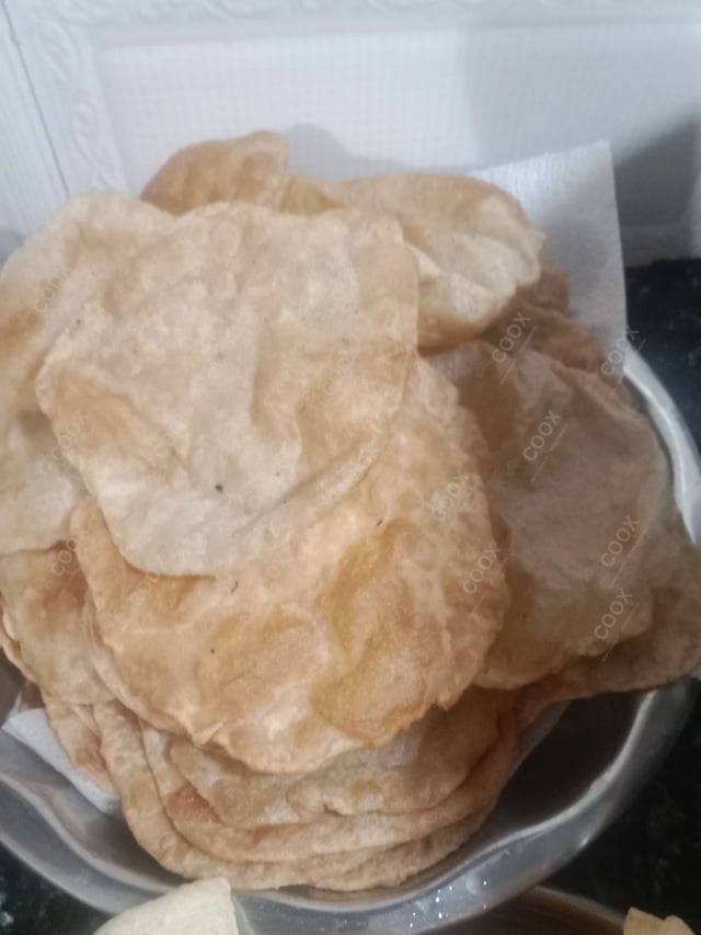 Delicious Pooris & Bedmis prepared by COOX