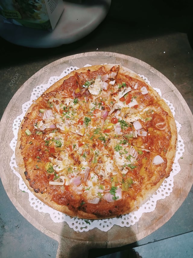 Delicious Veg Pizza prepared by COOX