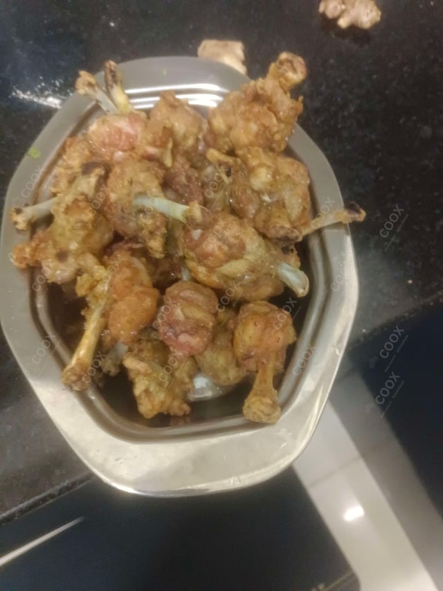 Delicious Chicken Lollipop prepared by COOX