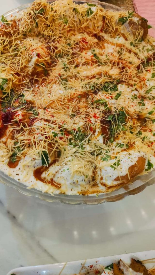 Tasty Dahi Vada cooked by COOX chefs cooks during occasions parties events at home