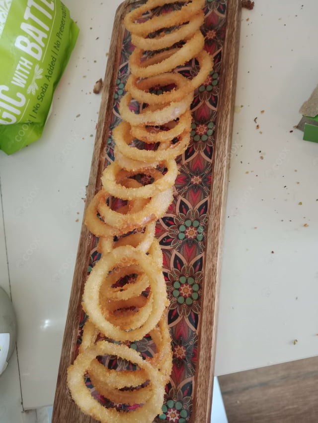 Tasty Onion Rings cooked by COOX chefs cooks during occasions parties events at home