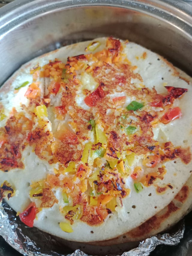 Tasty Mixed Veg Uttappam cooked by COOX chefs cooks during occasions parties events at home