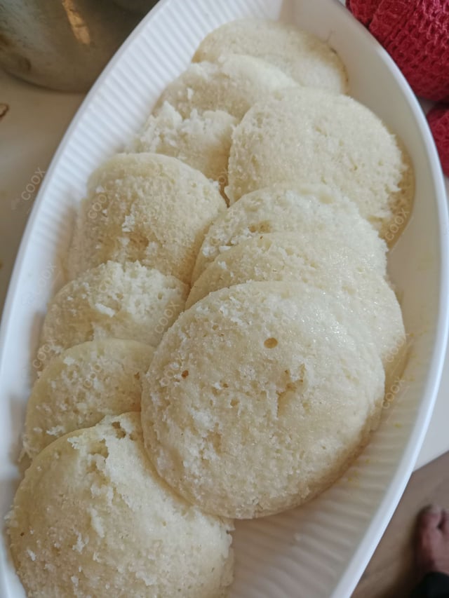 Tasty Plain Idli cooked by COOX chefs cooks during occasions parties events at home