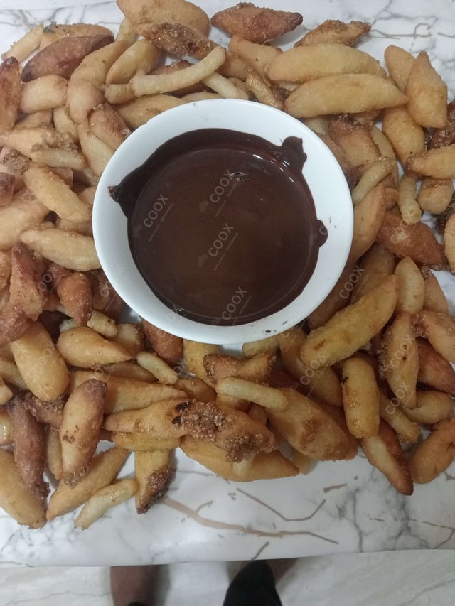 Tasty Churros cooked by COOX chefs cooks during occasions parties events at home