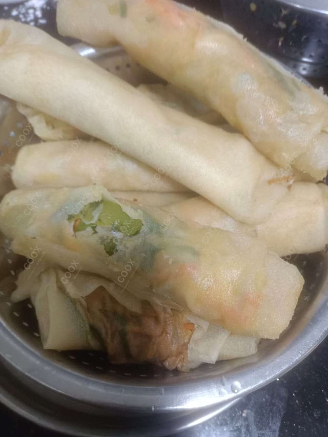 Delicious Veg Spring Rolls prepared by COOX