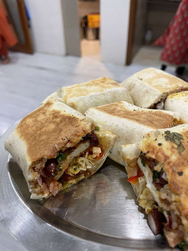 Tasty Veg Burritos cooked by COOX chefs cooks during occasions parties events at home