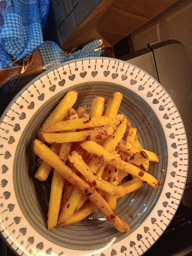 Delicious Honey Chilli Potato prepared by COOX