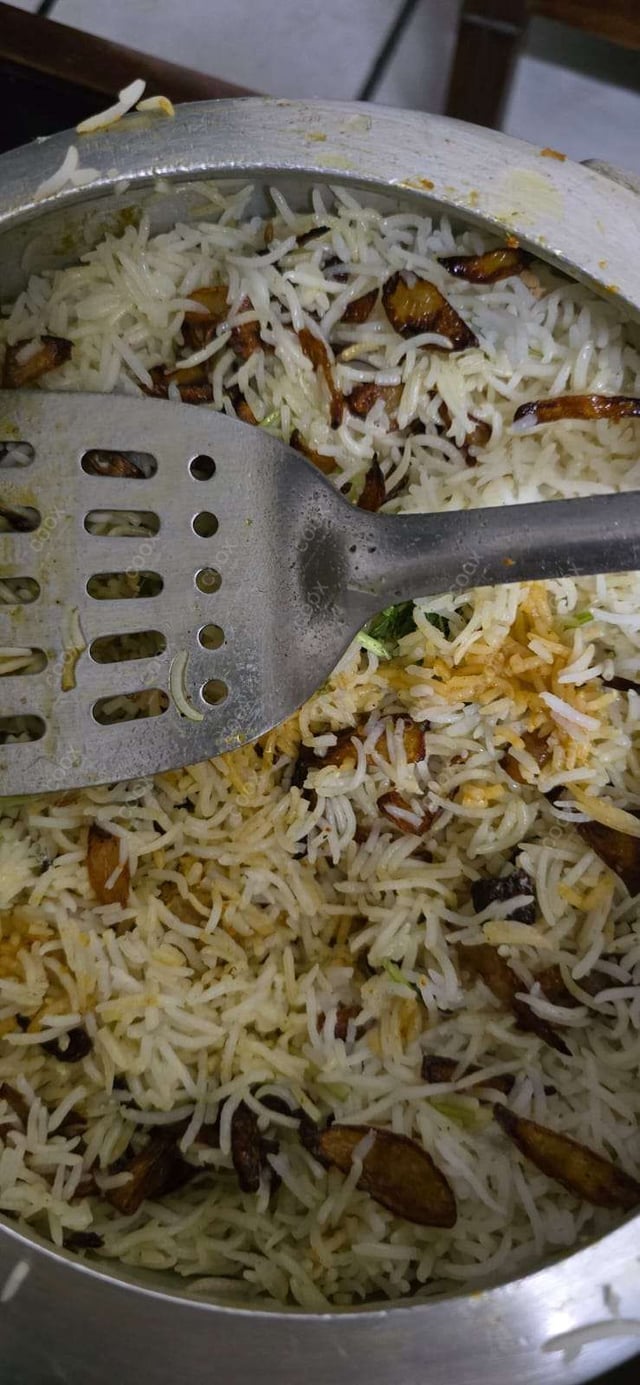 Delicious Veg Biryani prepared by COOX