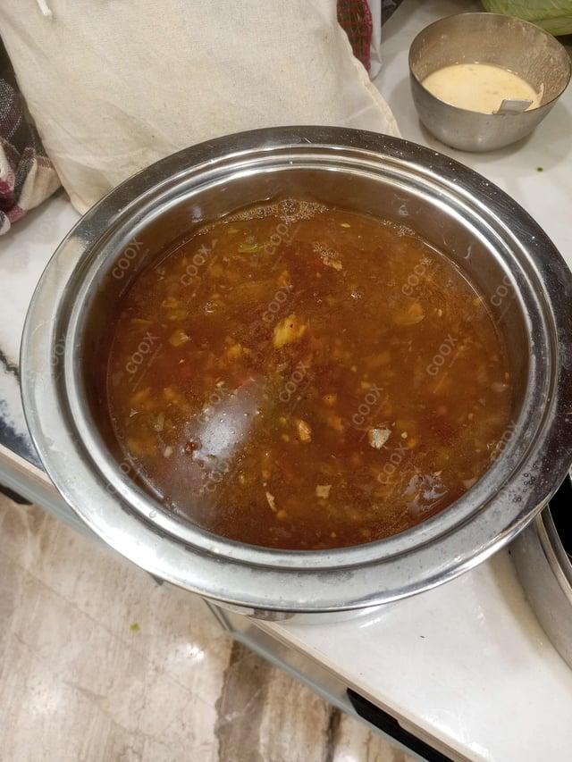 Delicious Vegetable Manchow Soup prepared by COOX