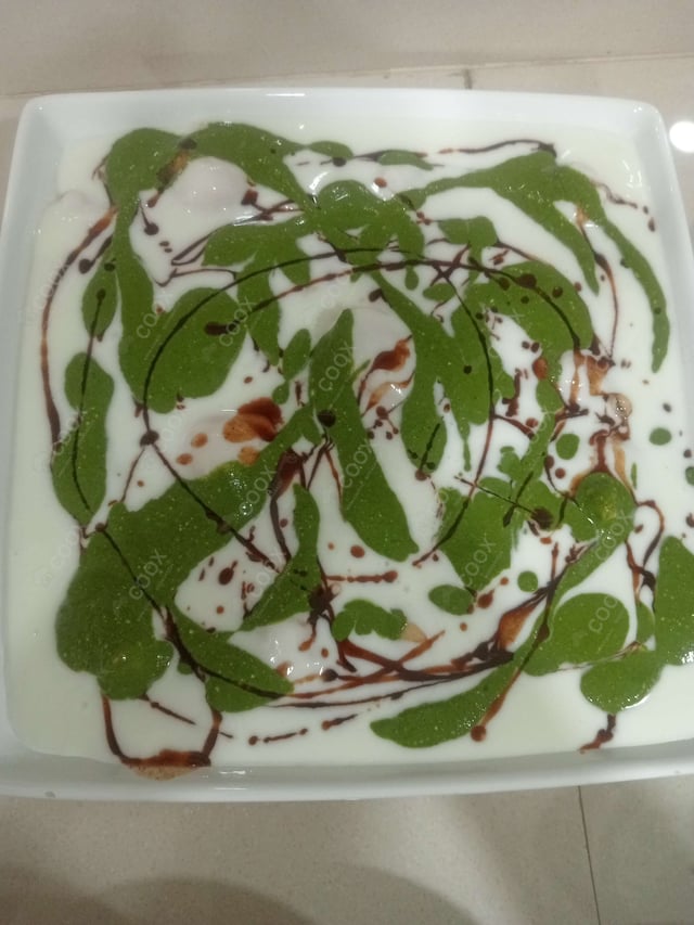 Delicious Dahi Bhalla prepared by COOX