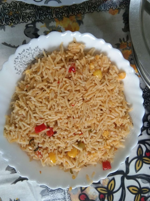 Tasty Mexican Rice cooked by COOX chefs cooks during occasions parties events at home