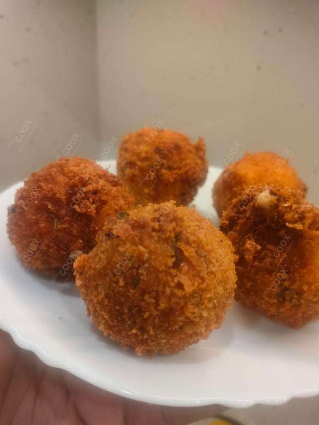 Delicious Fried Cheese Balls prepared by COOX