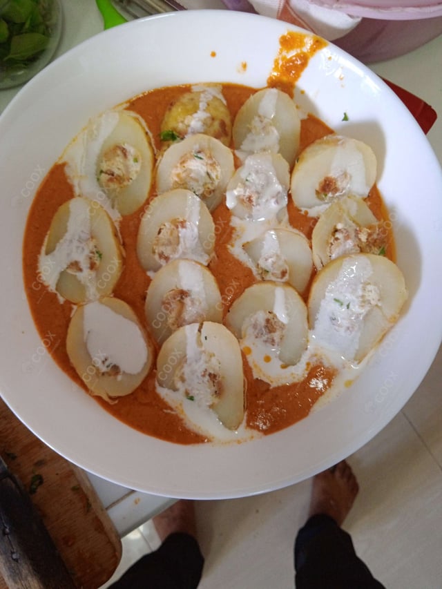 Delicious Stuffed Potatoes (Gravy) prepared by COOX