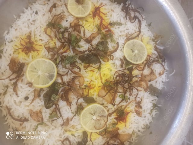 Tasty Chicken Biryani cooked by COOX chefs cooks during occasions parties events at home