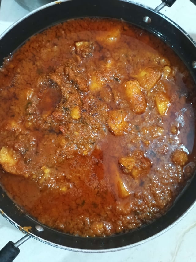 Delicious Dum Aloo prepared by COOX
