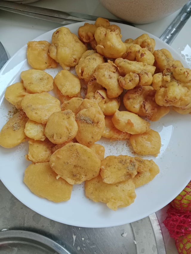 Tasty Bread Pakode cooked by COOX chefs cooks during occasions parties events at home