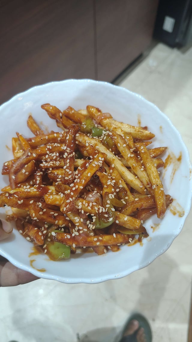 Delicious Honey Chilli Potato prepared by COOX
