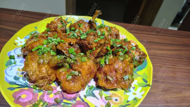 Delicious Chicken Lollipop prepared by COOX