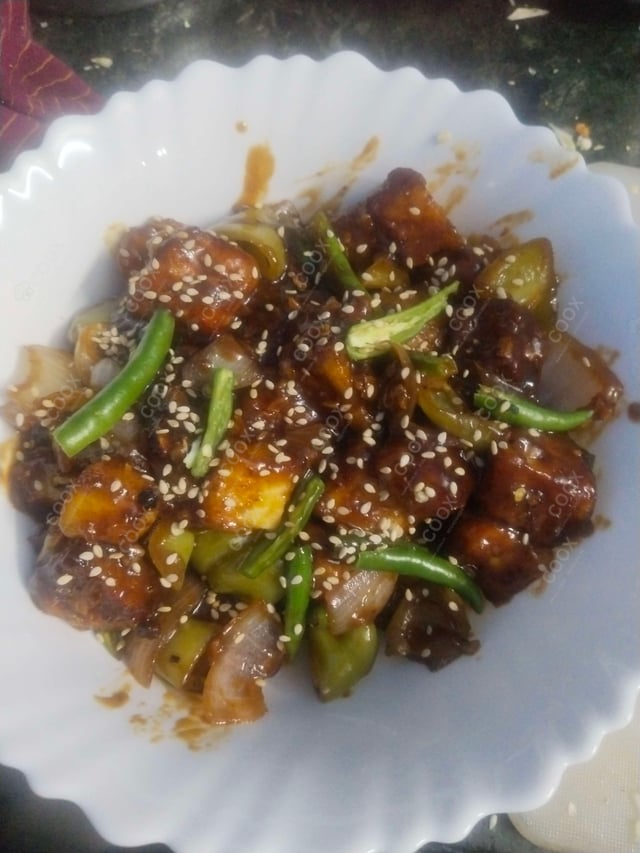 Delicious Chilli Paneer (Dry) prepared by COOX
