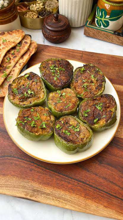 Delicious Bharwa Shimla Mirch prepared by COOX