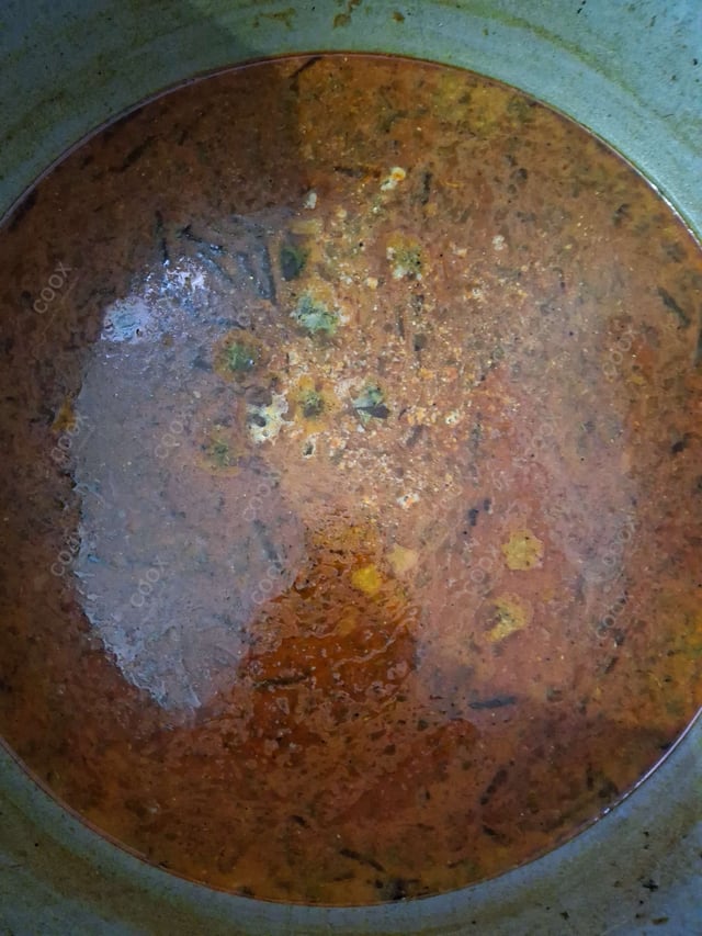 Delicious Rasam prepared by COOX