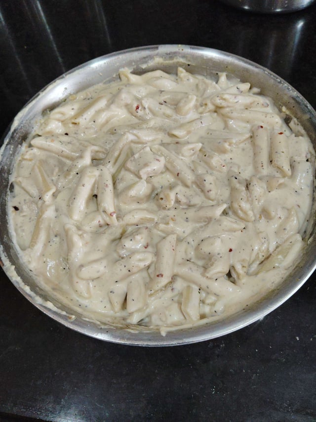Tasty Chicken Pasta in White Sauce cooked by COOX chefs cooks during occasions parties events at home