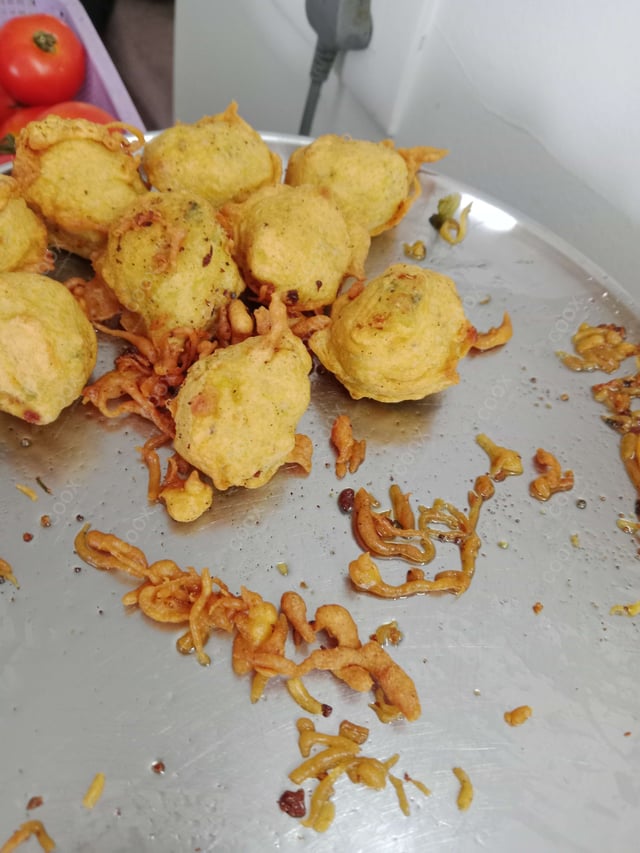 Tasty Aloo Bonda cooked by COOX chefs cooks during occasions parties events at home
