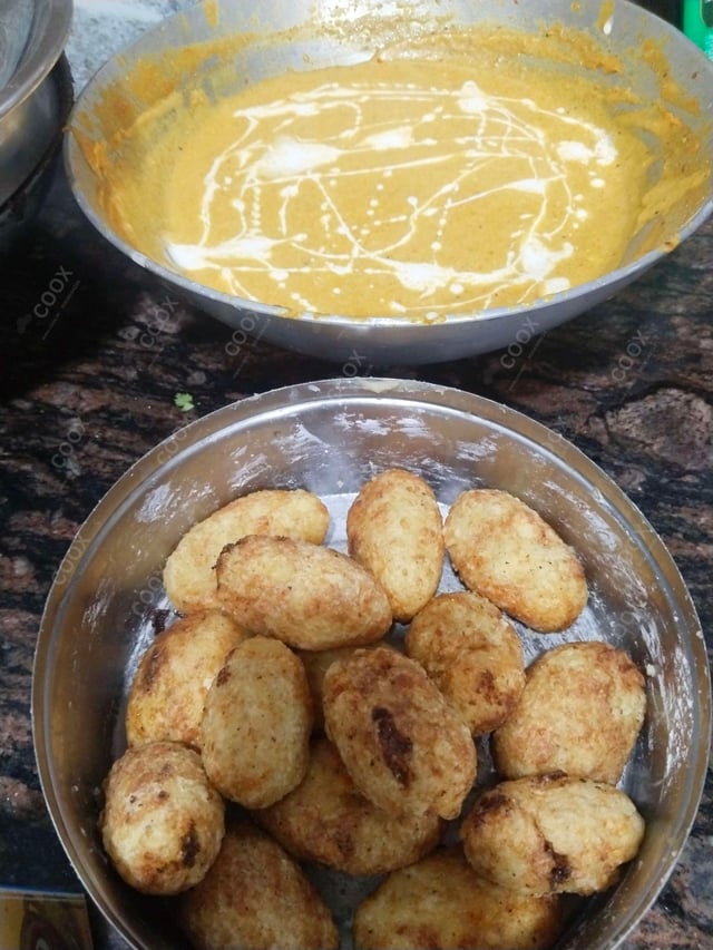 Delicious Malai Kofta (Orange Gravy) prepared by COOX