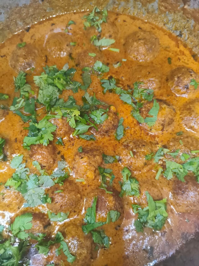 Delicious Malai Kofta (Orange Gravy) prepared by COOX