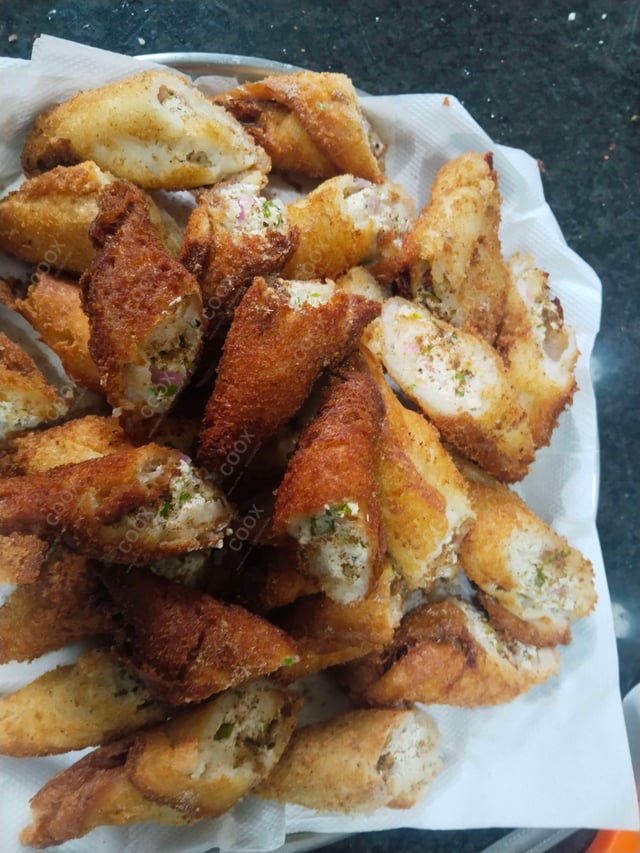 Delicious Dahi ke Sholey prepared by COOX