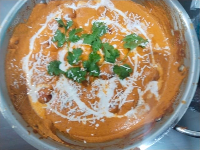 Delicious Malai Kofta (Orange Gravy) prepared by COOX