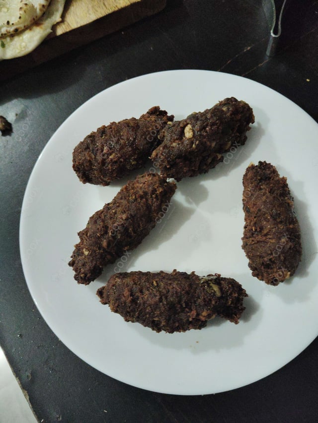 Delicious Mutton Seekh Kebab prepared by COOX