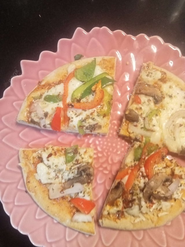 Delicious Veg Pizza prepared by COOX