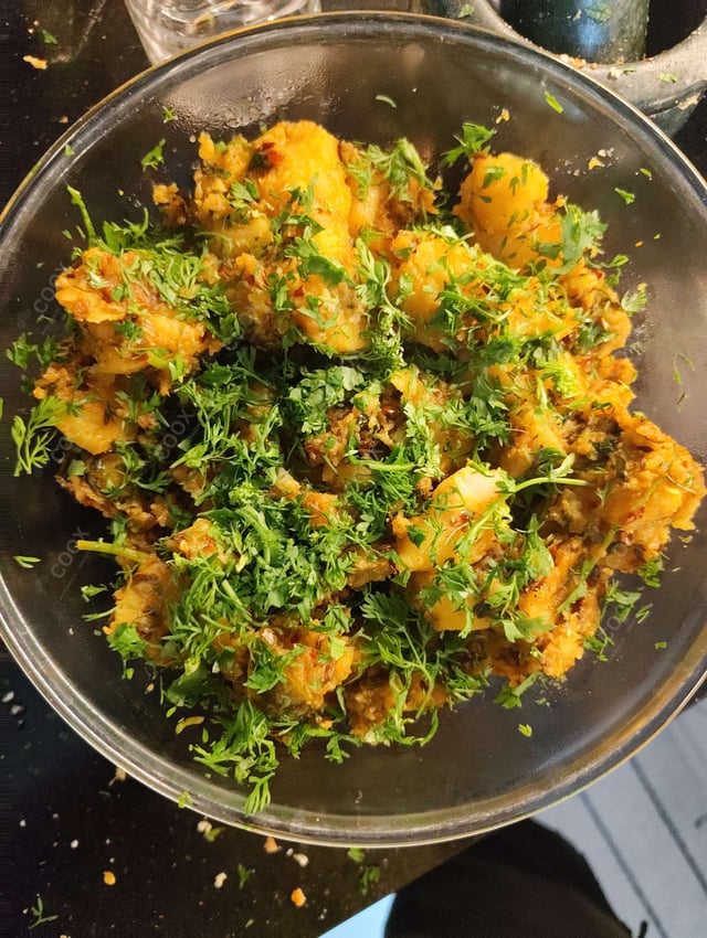 Delicious Jeera Aloo prepared by COOX