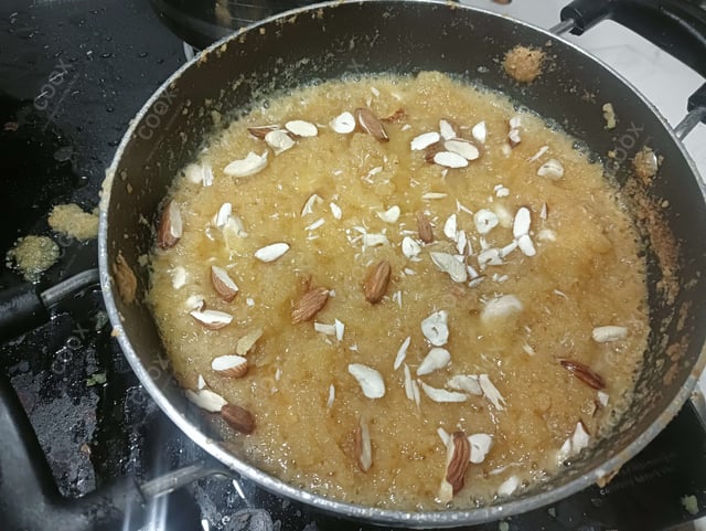 Delicious Moong Dal Halwa prepared by COOX