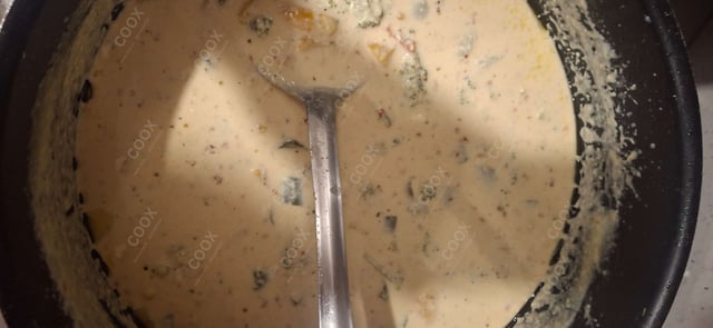 Tasty Chicken Pasta in White Sauce cooked by COOX chefs cooks during occasions parties events at home