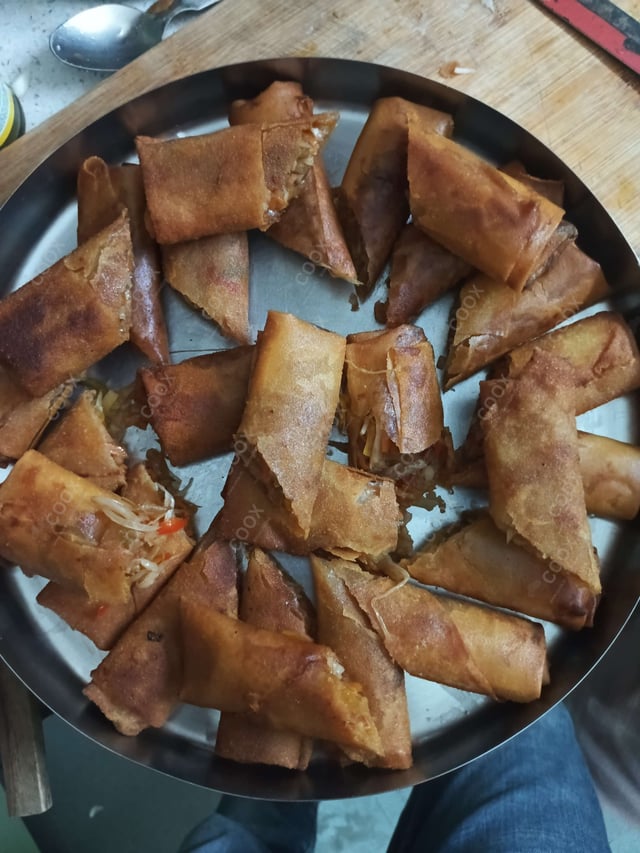 Delicious Veg Spring Rolls prepared by COOX