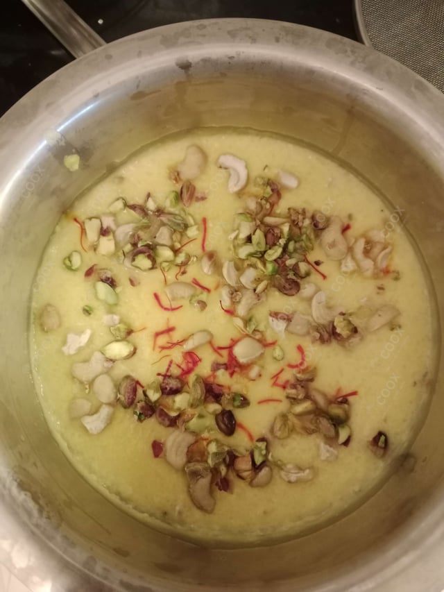 Tasty Mango Phirni cooked by COOX chefs cooks during occasions parties events at home