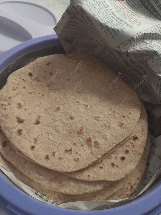 Delicious Tawa Rotis prepared by COOX