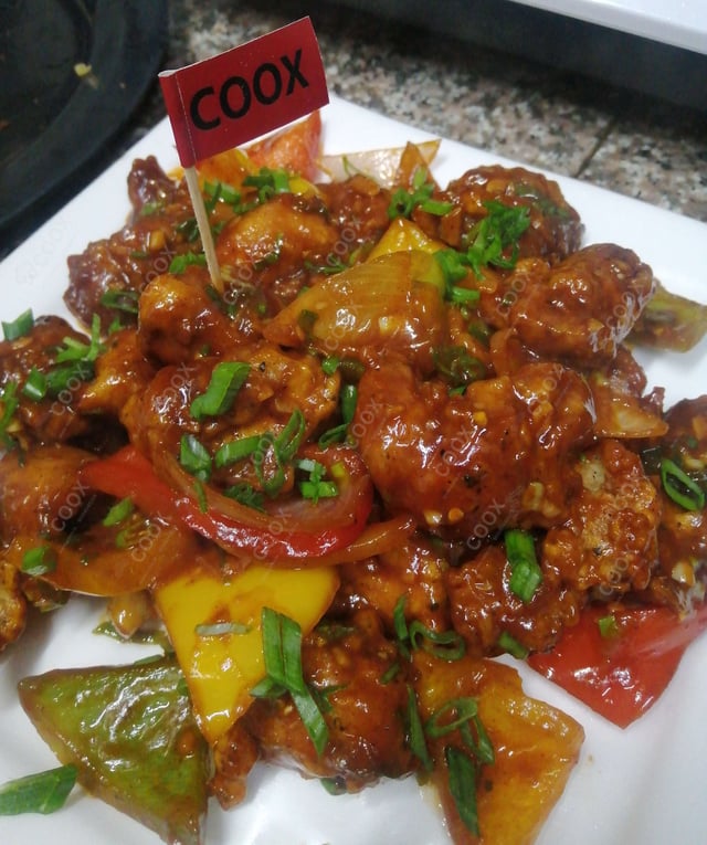 Tasty Chilli  Chicken cooked by COOX chefs cooks during occasions parties events at home