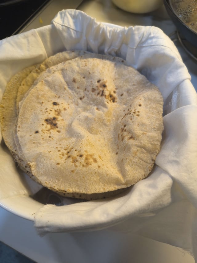 Delicious Tawa Rotis prepared by COOX