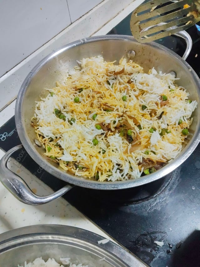 Delicious Schezwan Fried Rice prepared by COOX