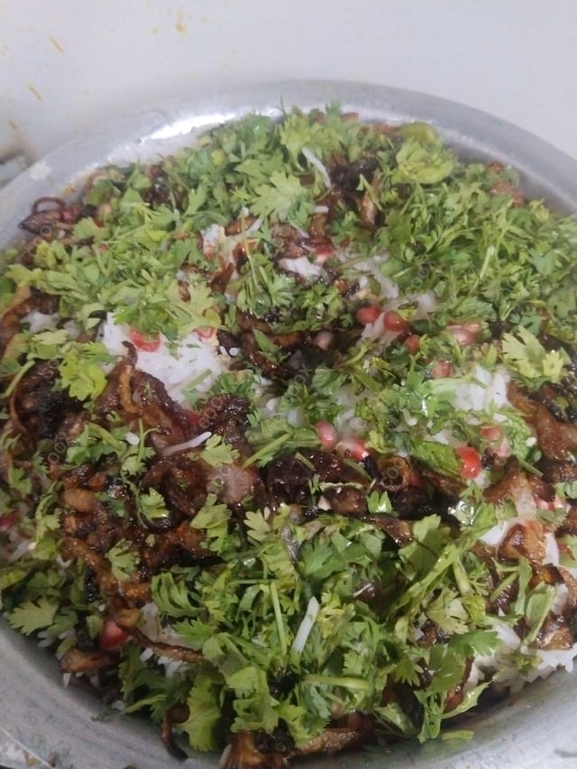 Delicious Veg Biryani prepared by COOX